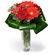 arrangement of gerberas and roses in a vase