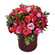 pink roses carnations and alstroemerias in a box